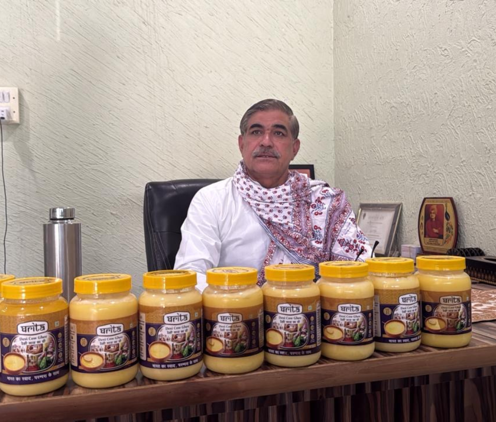 Ghrita A2 Desi Cow Ghee product display - premium Bilona ghee packaging